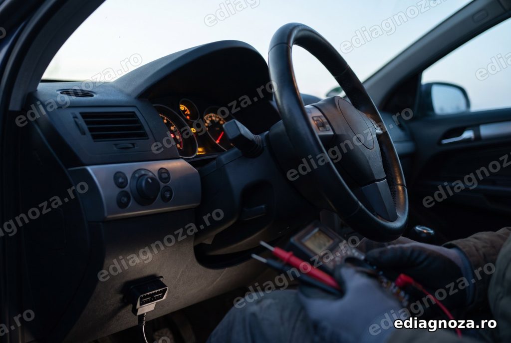 Martorul bujiilor incandescente aprins in bordul unei masini diesel, cu multimetru si interfata OBD